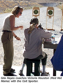 Gila Hayes coaches Victoria Houston (Red Hot Mama) with the Colt Sporter.