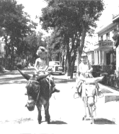 Marcia and Susan, circa 1949, Tsingtao, China. "As always, I ride the dark 'horse'"