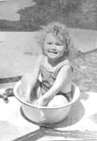 Marcia, age 2, in Berkeley, CA. Definitely pre-Haight-Ashbury
